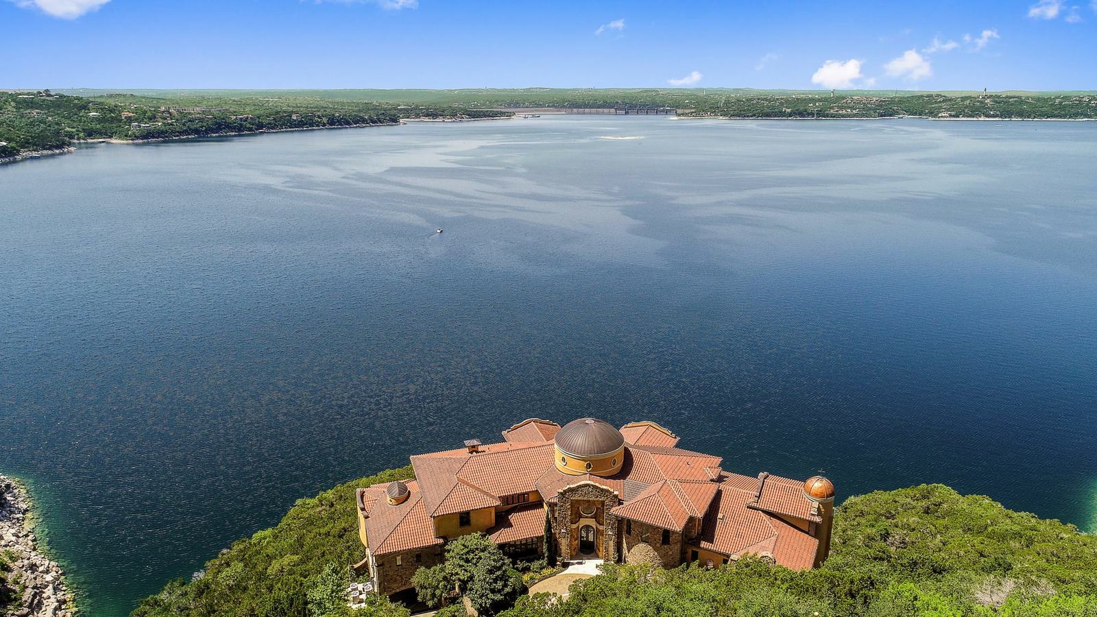 Home on a hilltop with the lake beyond