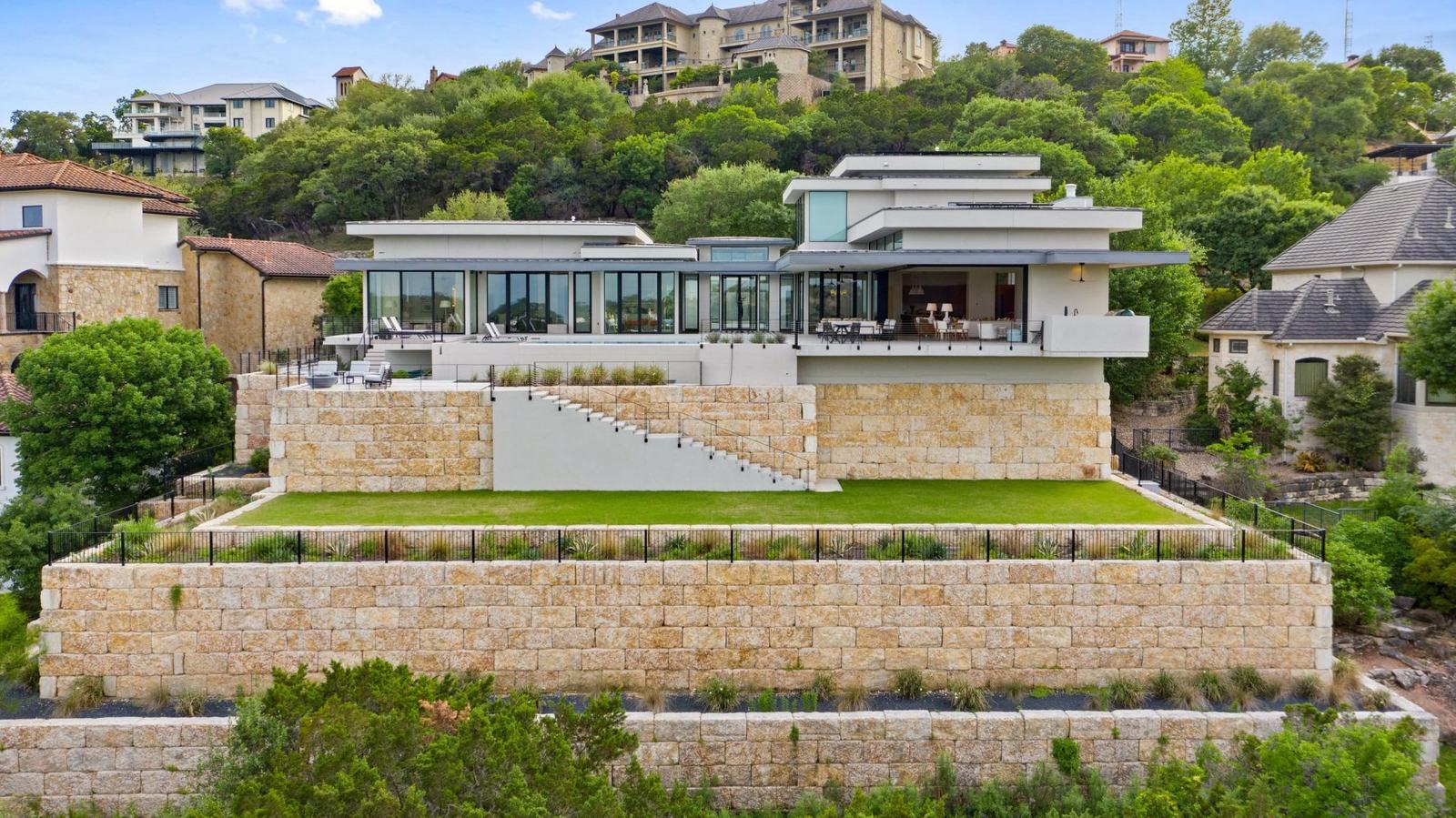 Modern home on a Hill Country ridge from the air