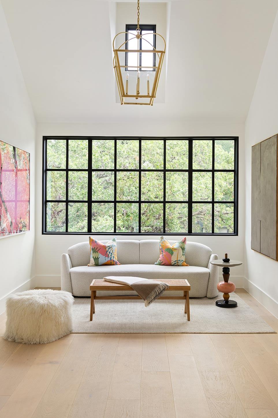 Living room with linen sofas and steel windows