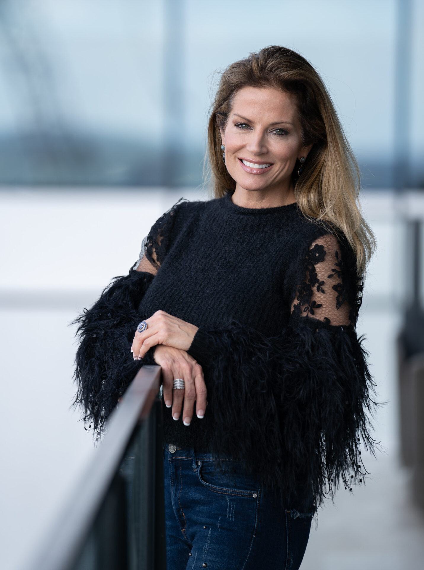 Realtor portrait on a high-rise terrace