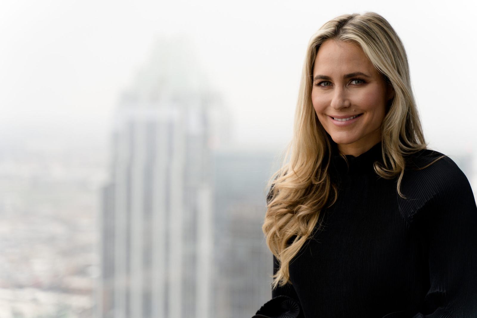 Realtor headshot against the Austin skyline