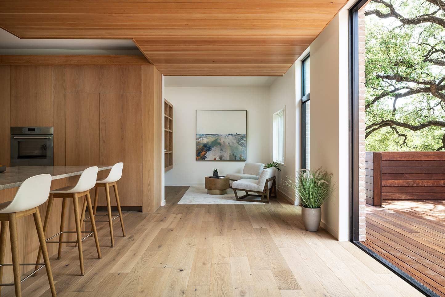 Kitchen opening to an outdoor terrace
