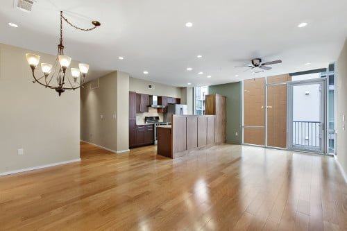 Empty dining and living space, before staging